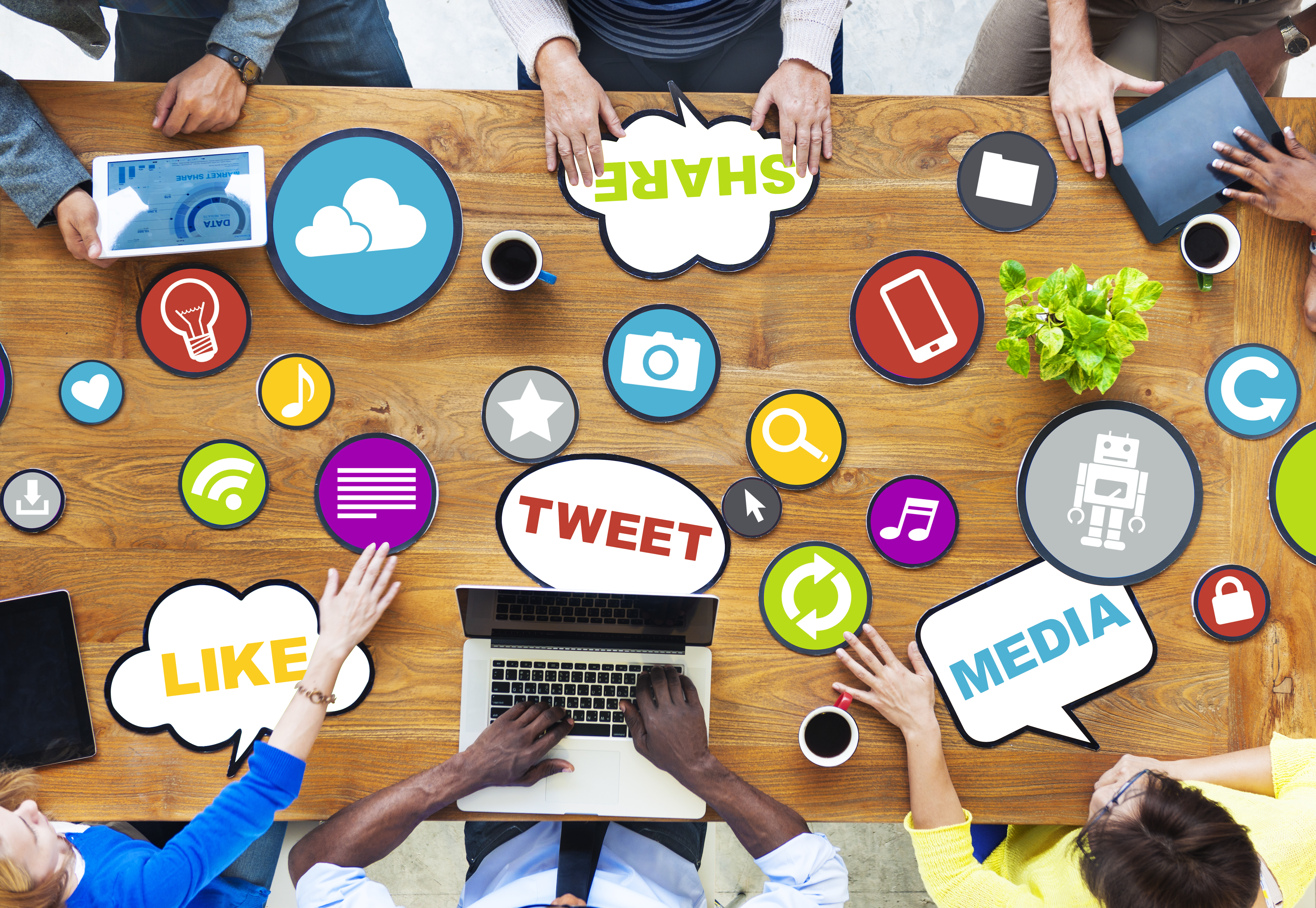 A group of people analyzing social media to find the right market
